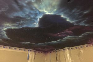 YM’s trademark galaxy-scape ceiling