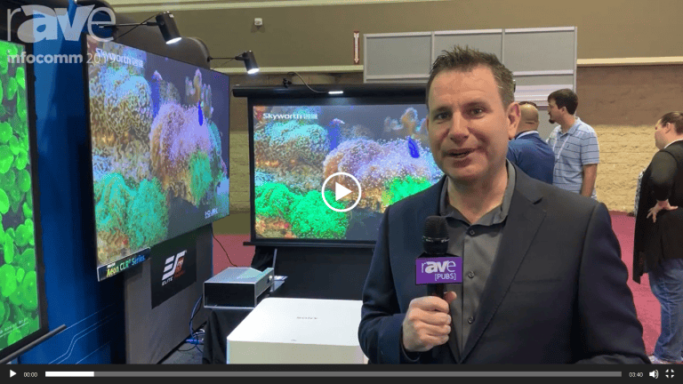 Quality projection screen display at InfoComm 2019 showcasing Elite ProAV® Saker DarkStar® 9 Series.