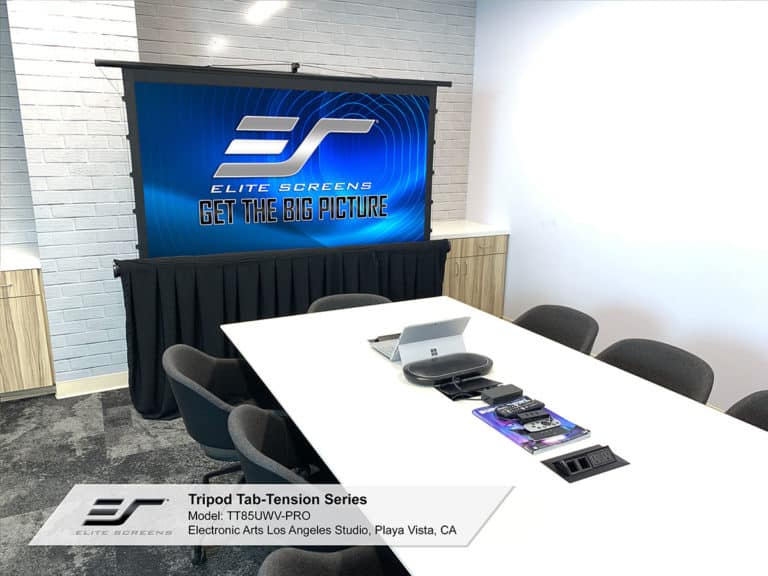 Tripod tab-tension projection screen in conference room setup.