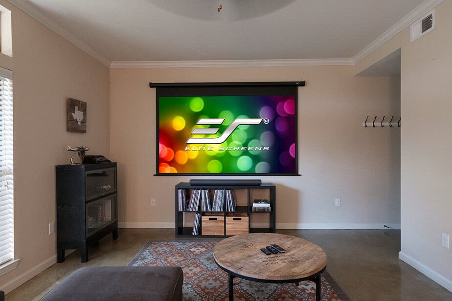 Projection screen with colorful bokeh background for home theater or presentation use.