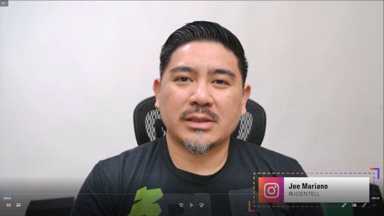 Man explaining projection screens for home theater or presentations.