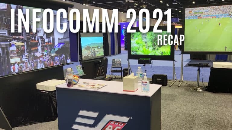 Projection screen setup at INFOCOMM 2021 conference for presentations and displays.