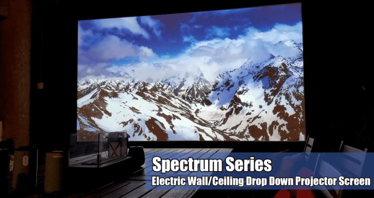 Spectrum Series electric wall/ceiling drop-down projection screen in a home theater setup.