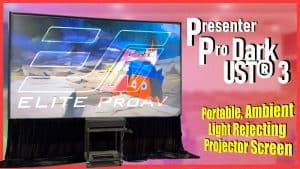 Portable projector screen with a colorful backdrop and promotional graphics.